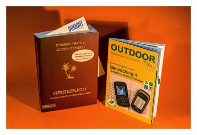 Die Bücher Reisebuch und Geocaching II werden hier verlost